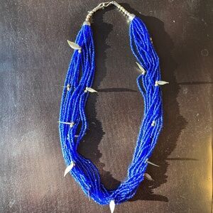 Artisnal hand-made seed bead necklace in cobalt blue.